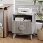 A 1/2-striped nightstand with a charging station, featuring 2 drawers, an open shelf, and legs, suitable for the bedroom, sofa area, and living room.