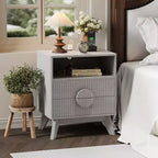 A 1/2-striped nightstand with a charging station, featuring 2 drawers, an open shelf, and legs, suitable for the bedroom, sofa area, and living room.